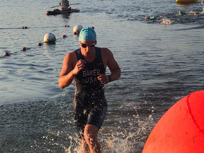 first male out of the water heading from the beach, through the chute to the bikes