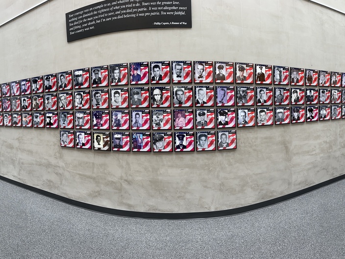 A panoramic view of the Vietnam War Memorial Wall located at the John Spoor Broome Library at CSU Channel Islands. Captured by Betsie Garcia, Communications Assistant of the Oxnard Film Society, the wall features 114 individual plaques honoring brave service members from Ventura County who were KIA, MIA, or casualties of the Vietnam War. This solemn tribute is part of the exhibit We Remember: From Ventura County to Vietnam and Back, and will remain on display until May 30, 2025.